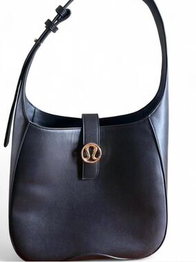 lululemon Black Leather Shoulder Bag with Gold Logo Accent, used 2 weeks